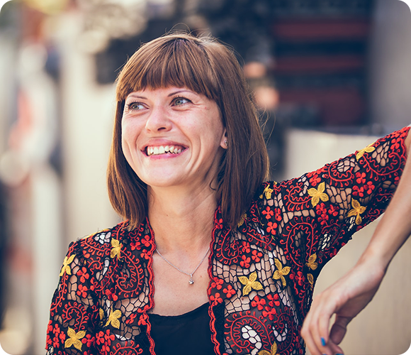 smiling woman in behavioral health program at treatment center