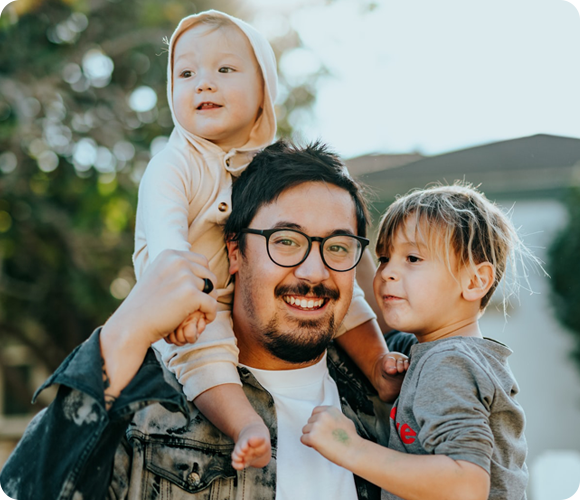 father with his two children outside of rehab facility in Orange County