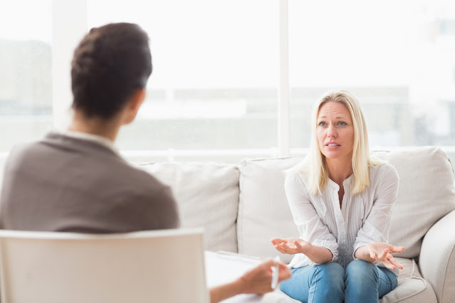woman speaking with therapist in Christian counseling